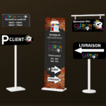 Signalétique extérieure Cléron Diffusion – panneaux directionnels, enseigne et totem d’accueil.