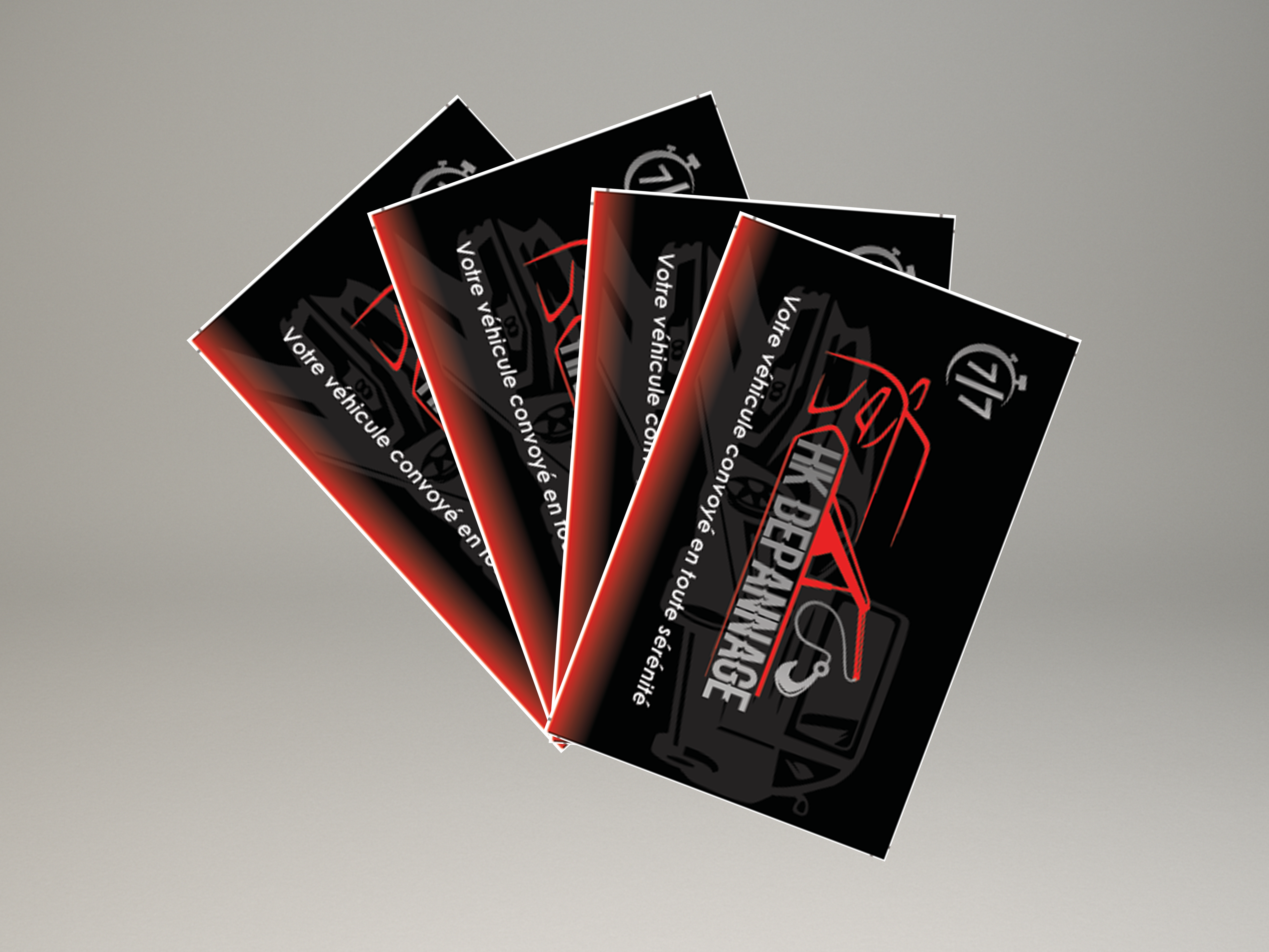 Flyers HK Dépannage avec logo rouge et noir et slogan “Votre véhicule convoyé en toute sérénité”.